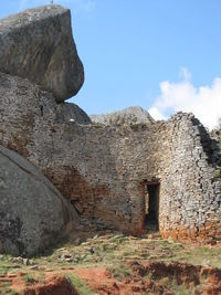 Low angle view of old ruin building against sky