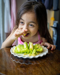 Portrait of a girl eating food