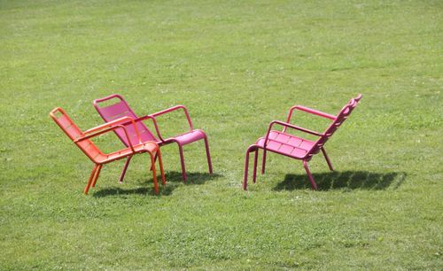 Chairs chair on green landscape