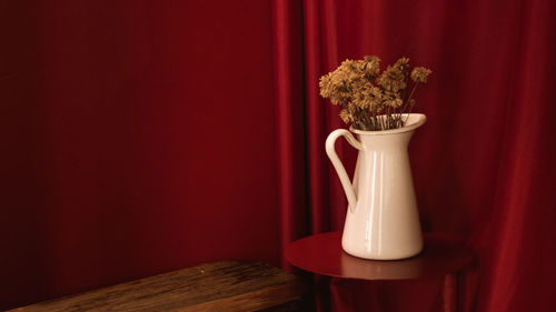 Close-up of potted plant on table at home