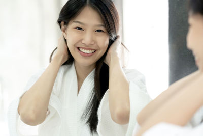 Portrait of a smiling young woman