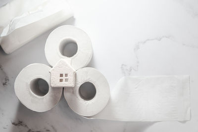 High angle view of papers on table against white background