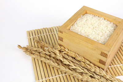 High angle view of wicker basket on wall