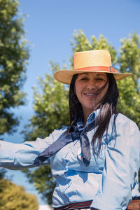 Argentinian woman wearing traditional clothing outdoors