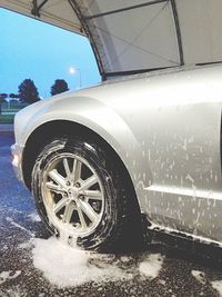 Close-up of vehicle wheel in winter