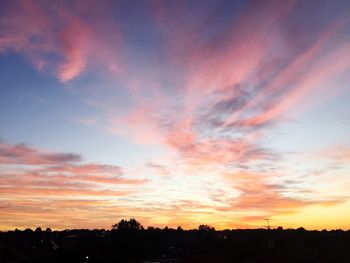 Silhouette of landscape against dramatic sky