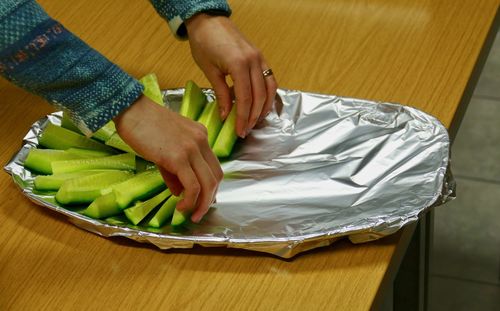 Close-up of hands on table