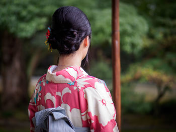 Rear view of woman in kimono