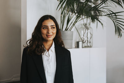 Smiling woman in office