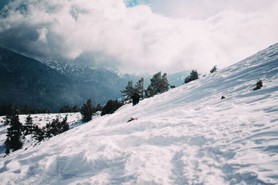 Snow covered mountain against sky