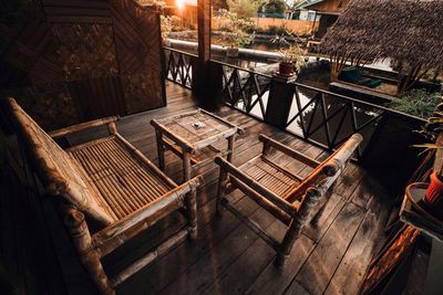 High angle view of empty chairs and tables in cafe