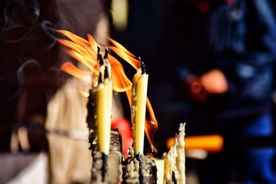 Close-up of illuminated candles at fushimi inari-taisha