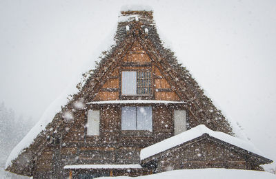 Close-up of traditional house during winter