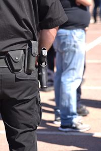 View of policeman's gun in holster