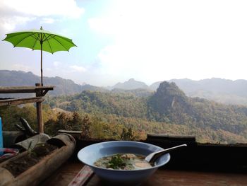 View of food on table against mountains