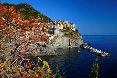 Residential district on rocky mountain by sea
