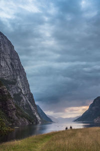 Scenic view of fjord against sky