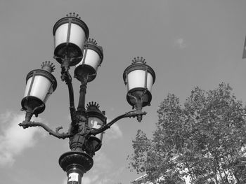 Low angle view of street light against sky