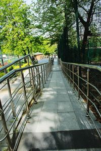Footbridge over footpath in city