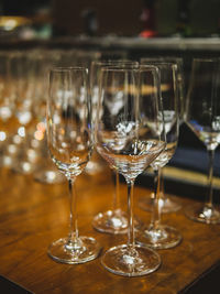 Close-up of wine glasses on table