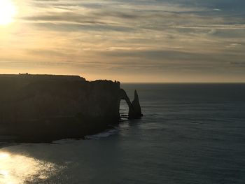 Scenic view of sea at sunset