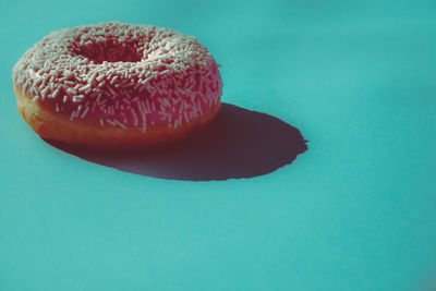 Close-up of dessert against blue background