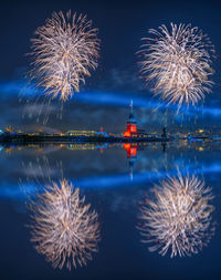 Maiden's tower and firework display at night