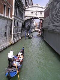 High angle view of people traveling in gondola at grand canal