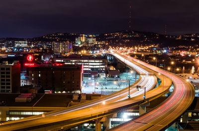 Light trails on city street at night