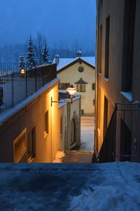 View of buildings in city during winter