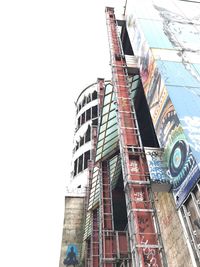 Low angle view of skyscraper against sky