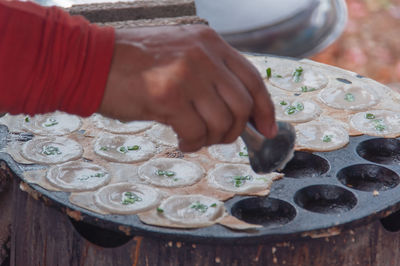 High angle view of man working on table