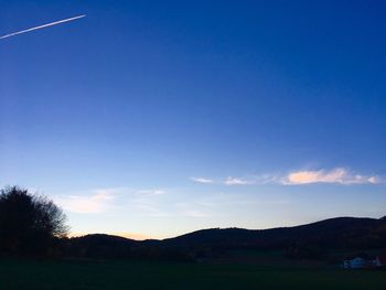 Scenic view of silhouette landscape against sky during sunset