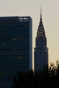 Low angle view of office building against sky