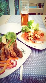 Close-up of served food on table