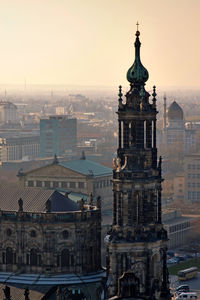 View of buildings in city against sky