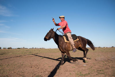 Argentinian gaucho playing traditional sport