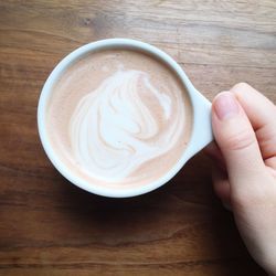 Close-up of cappuccino on table