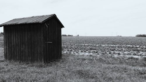 View of field against clear sky