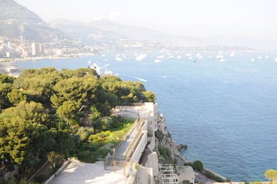 High angle view of townscape by sea