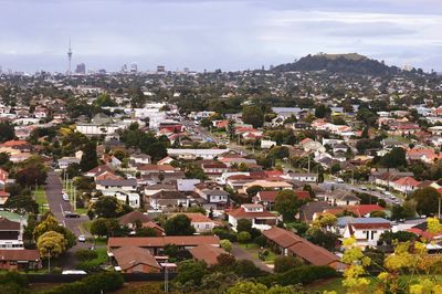 Aerial view of town against sky