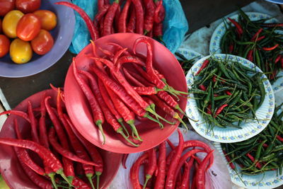 High angle view of chili peppers for sale at market