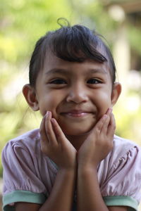 Close-up of young woman looking away