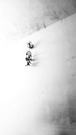 High angle view of people on snow field