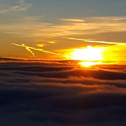 Low angle view of clouds in sky during sunset