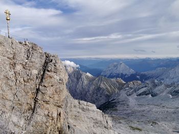 Scenic view of rocks in mountains against sky