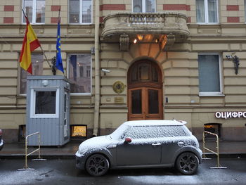 Vintage car against building