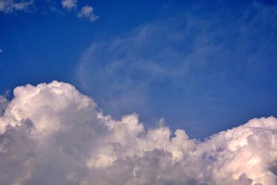 Low angle view of clouds in blue sky