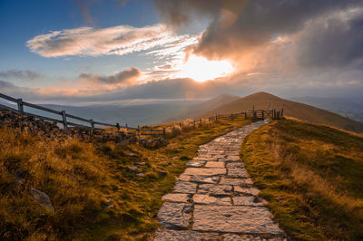 Scenic view of landscape against sky during sunset