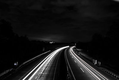 Cars moving on road at night